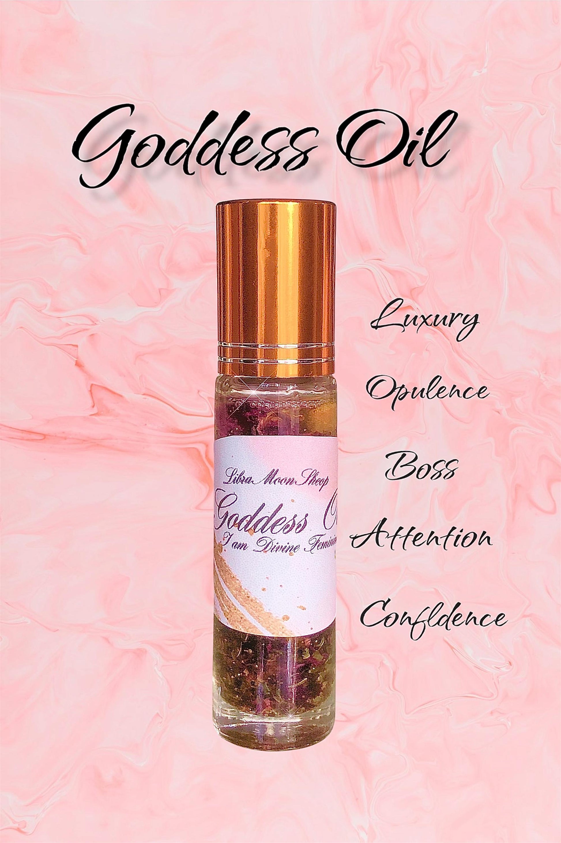 Goddess Beauty elixir Oil roller bottle with gold cap on a pink background with words luxury, opulence, boss, attraction, and confidence on a pink background. 