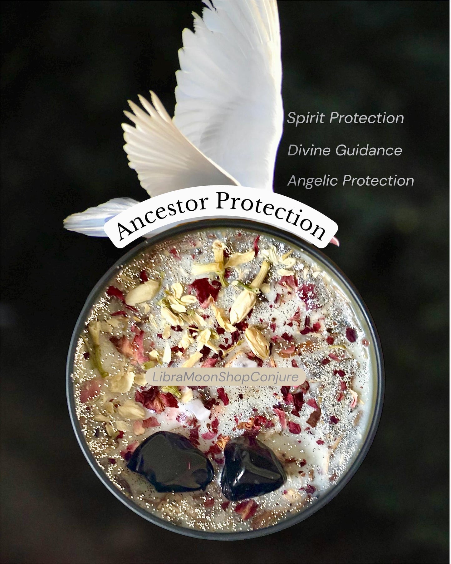 Metaphysical candle with 'Ancestor Protection' text, feathers, and stones on a dark background with the texts spirit protection, divine guidance, angelic protection. Candle has white dove wings flying over candle. Two black obsidian crystals are in candle. 