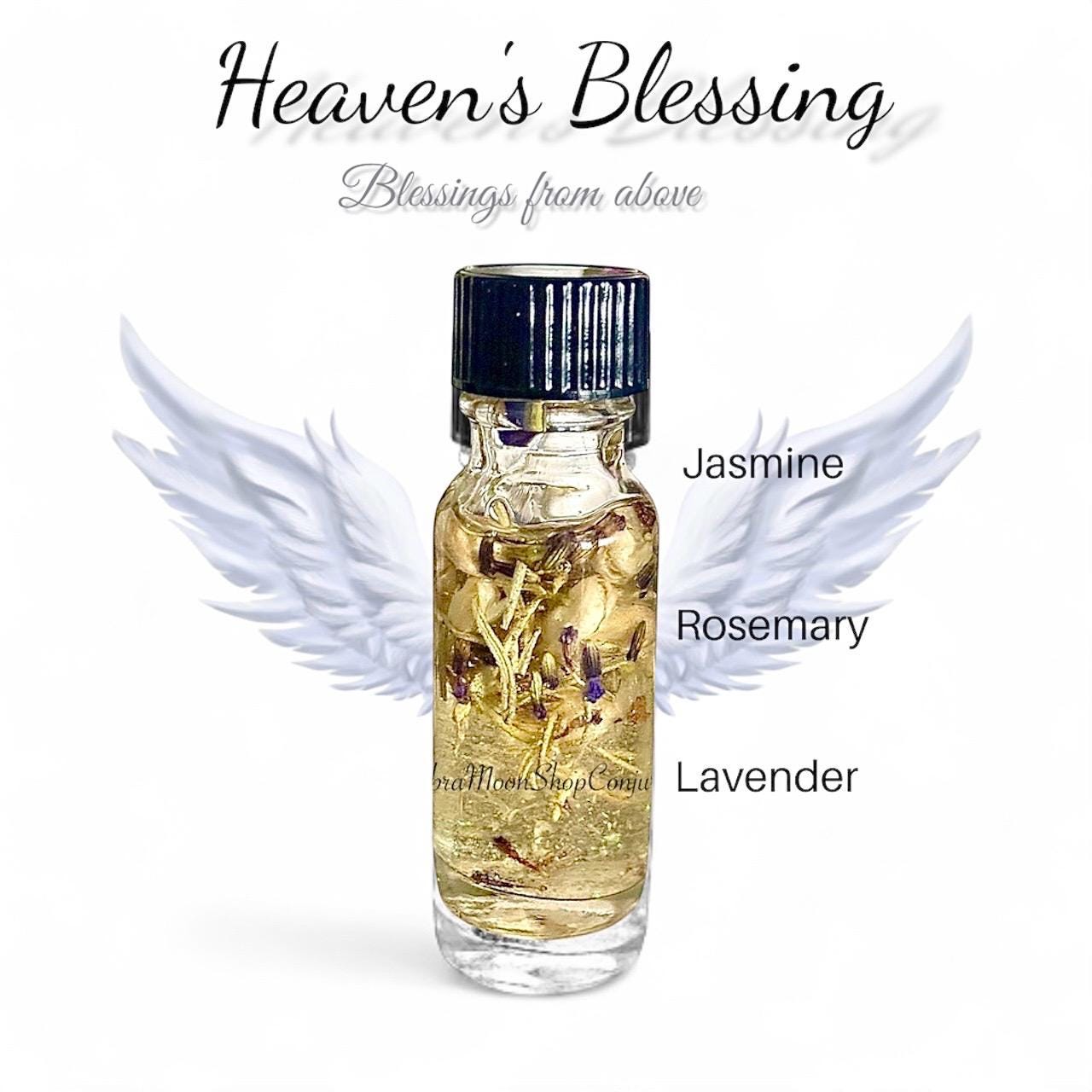 Bottle of 'Heaven's Blessing ritual elixir Oil with angel wings and labeled ingredients, Jasmine, Rosemary, and Lavender herbs. on a white background. Blessings from above metaphysical oil. 